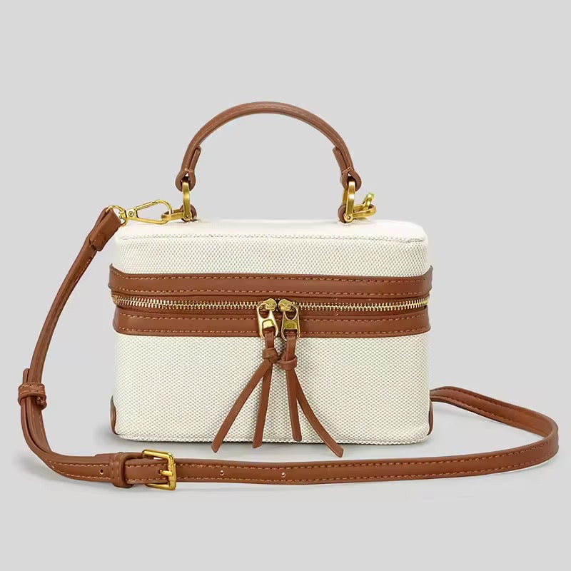 Stylish shoulder bag made of canvas and leather