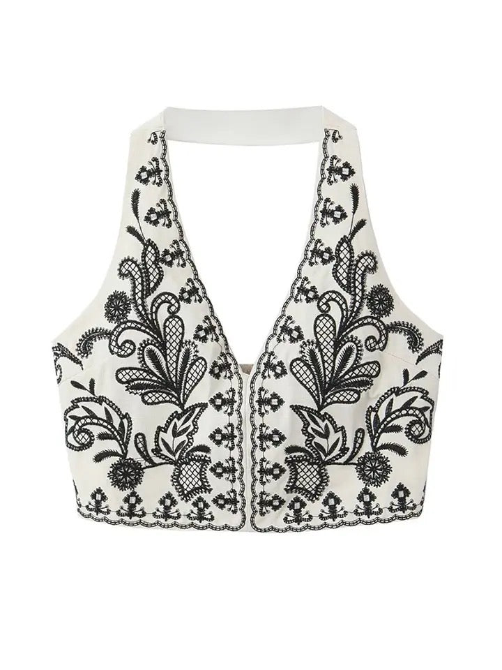 Elegant black and white embroidered crop top and skirt set