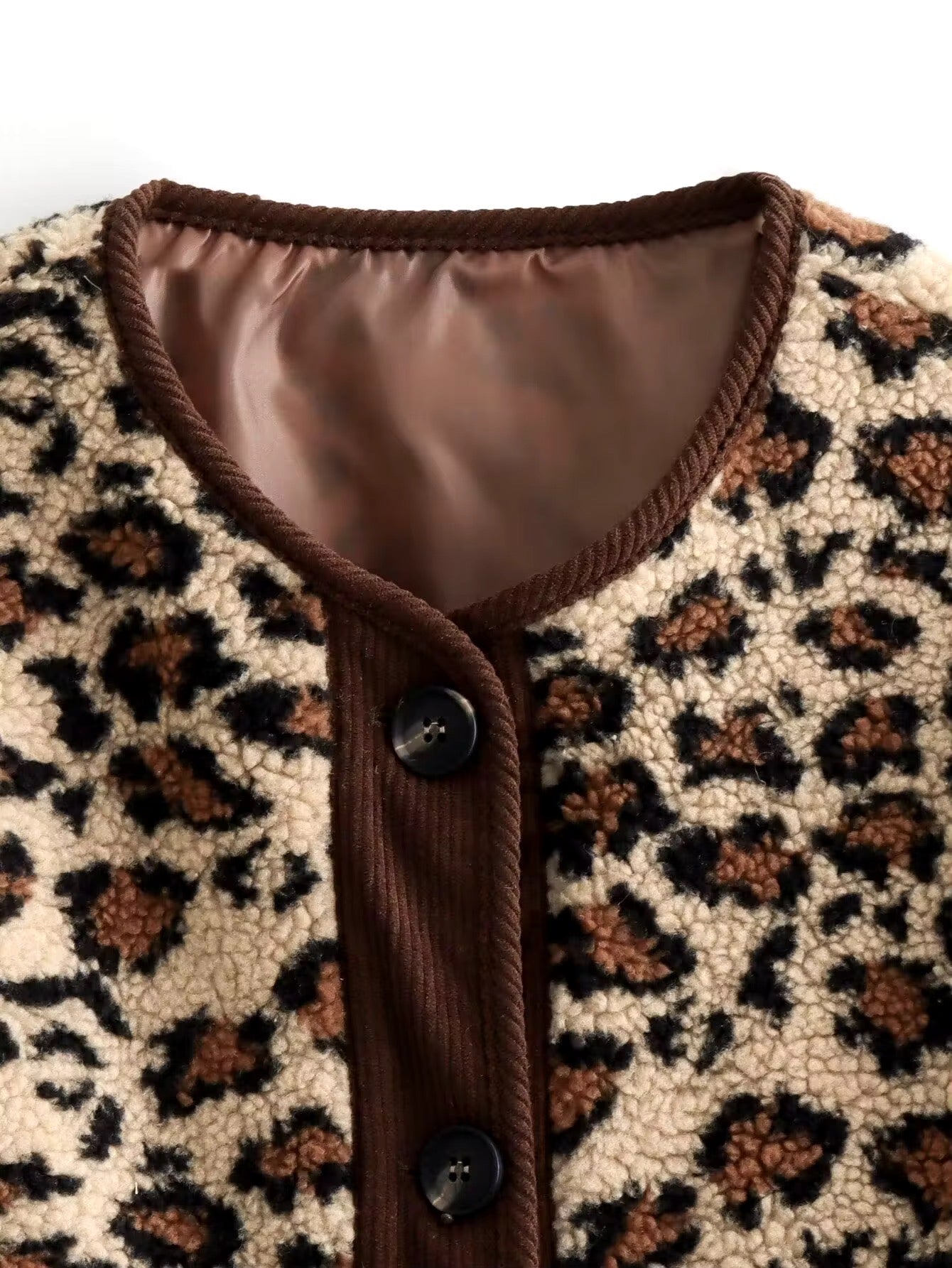 Cozy leopard cardigan with button placket