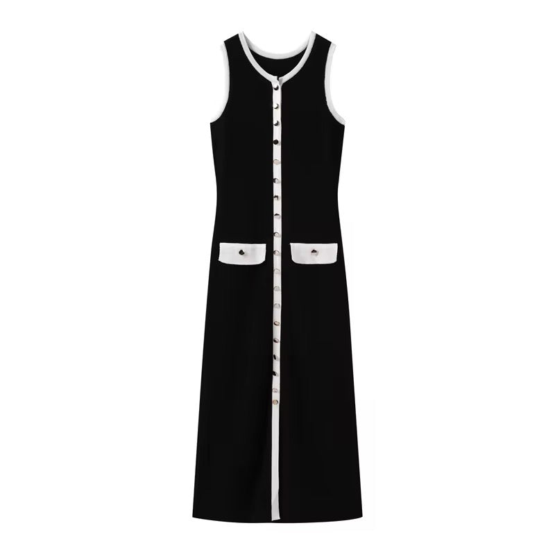 Elegant black and white dress with gold button details