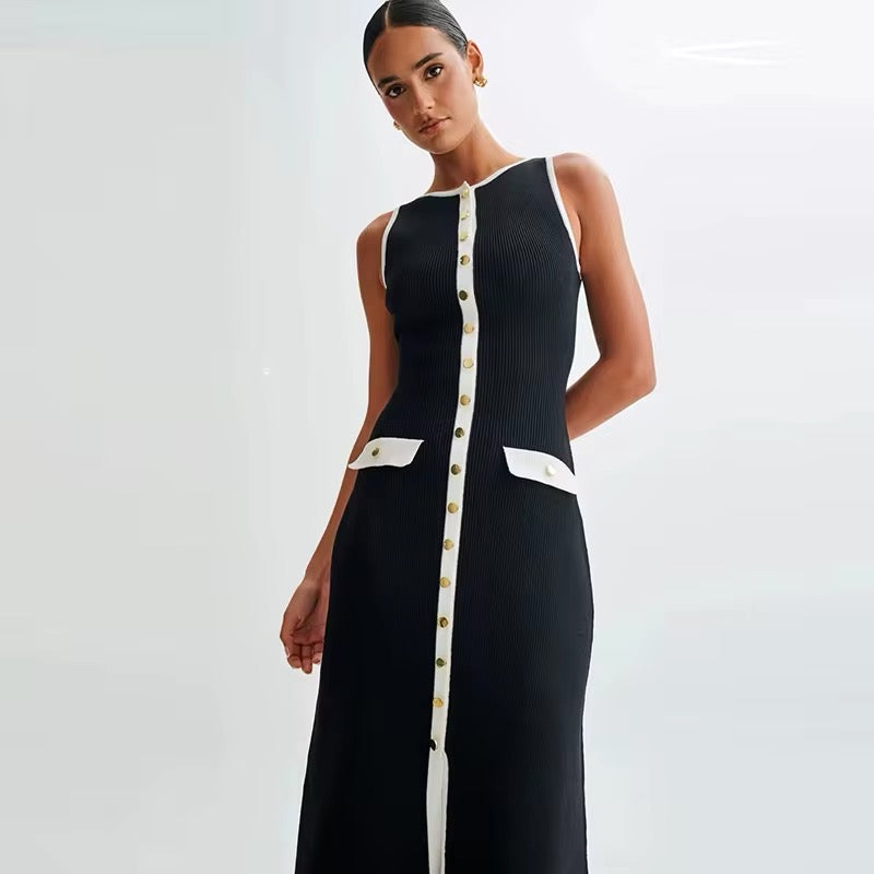 Elegant black and white dress with gold button details