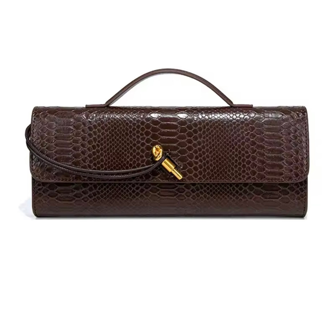 Luxurious clutch bag in crocodile look