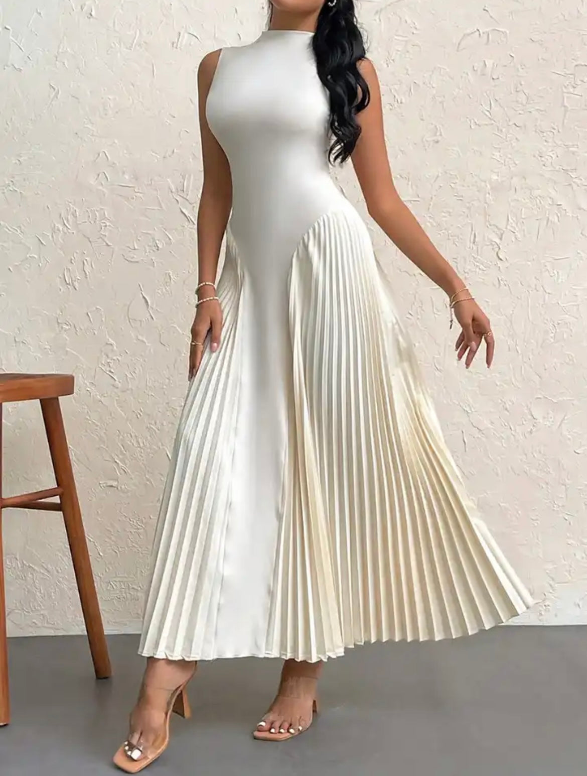 Sleeveless maxi dress with pleated details in cream