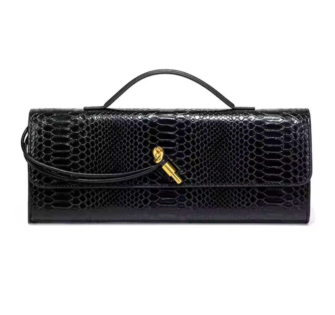 Luxurious clutch bag in crocodile look