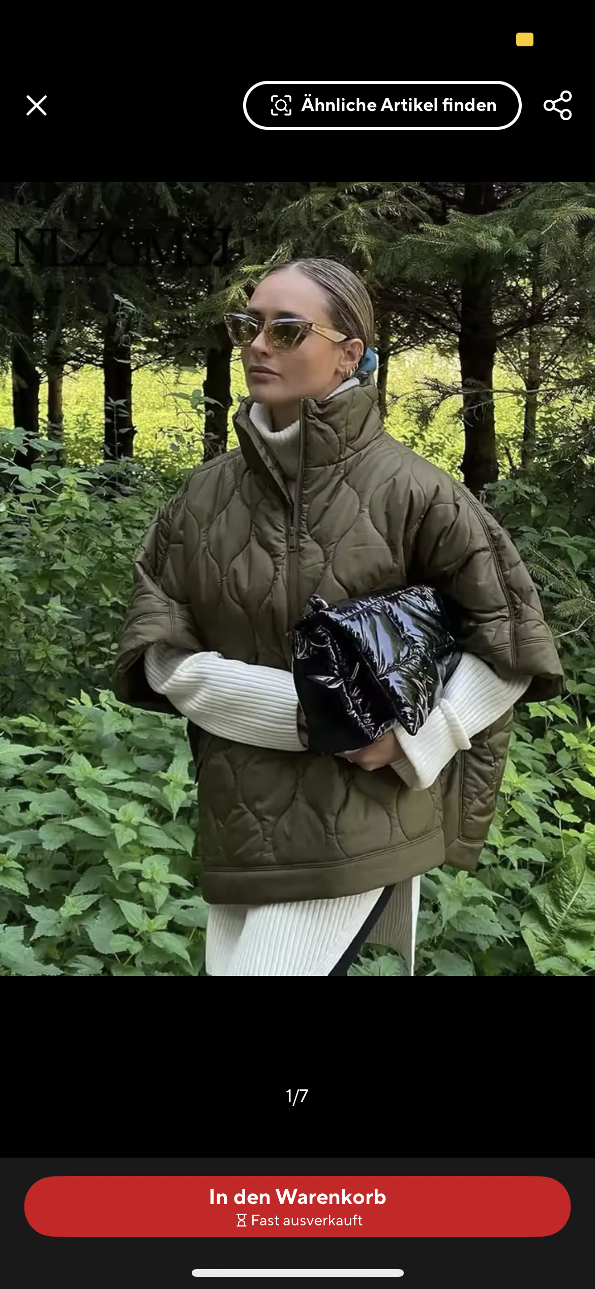 Quilted poncho with zipper in olive green