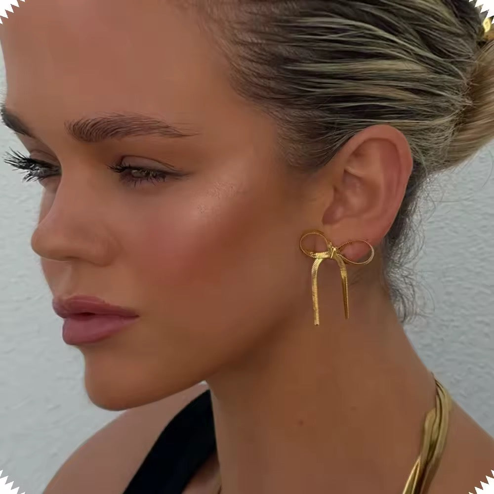 Elegant golden bow earrings
