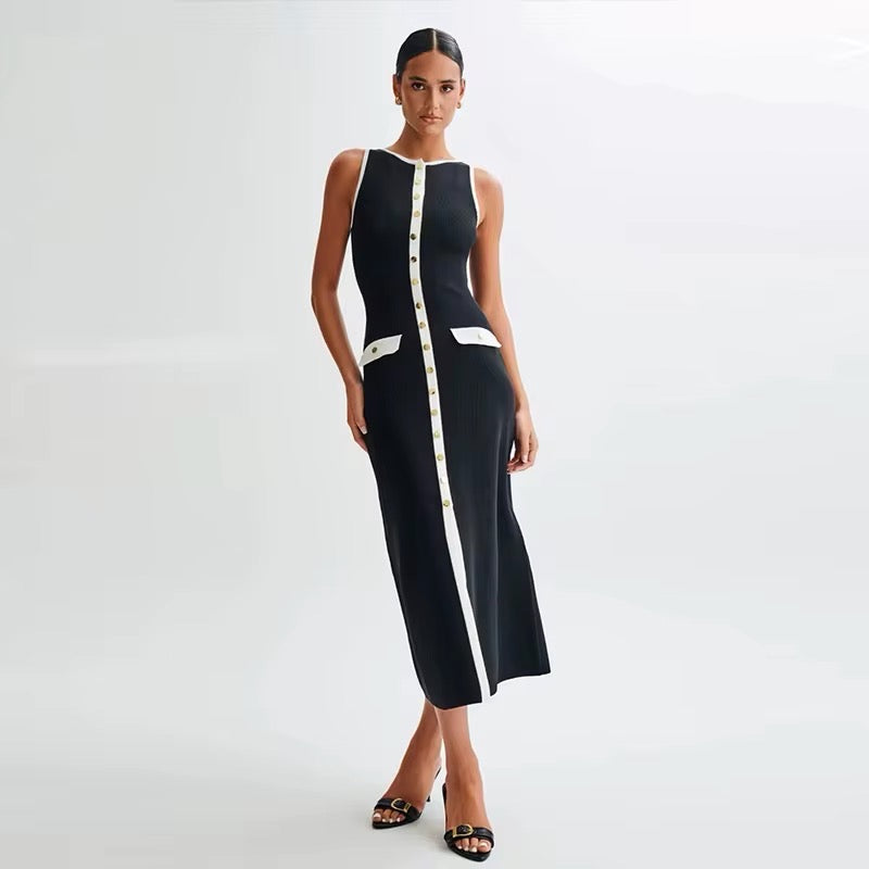 Elegant black and white dress with gold button details