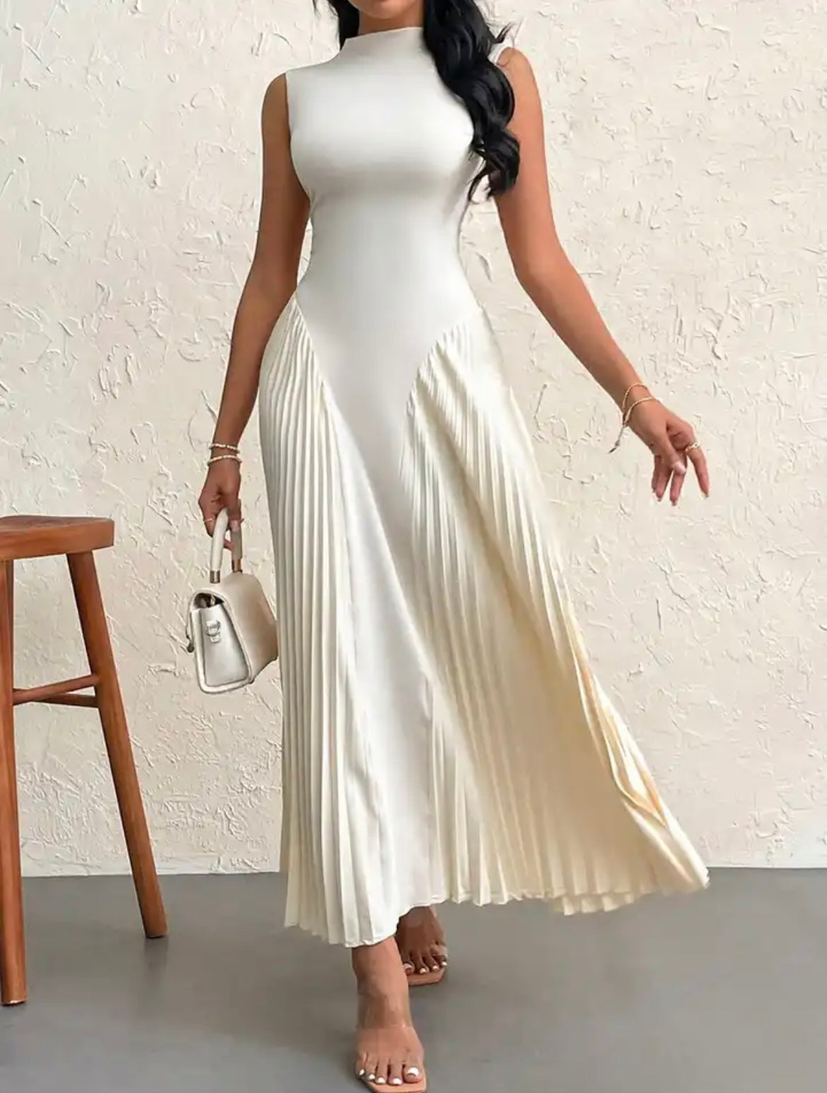 Sleeveless maxi dress with pleated details in cream