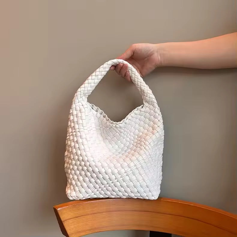 Braided handbag made of imitation leather