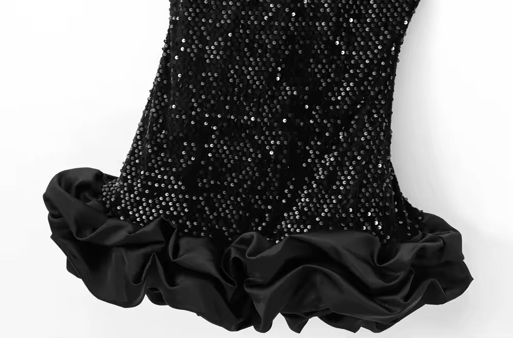 Robe élégante à paillettes avec ourlet à volants