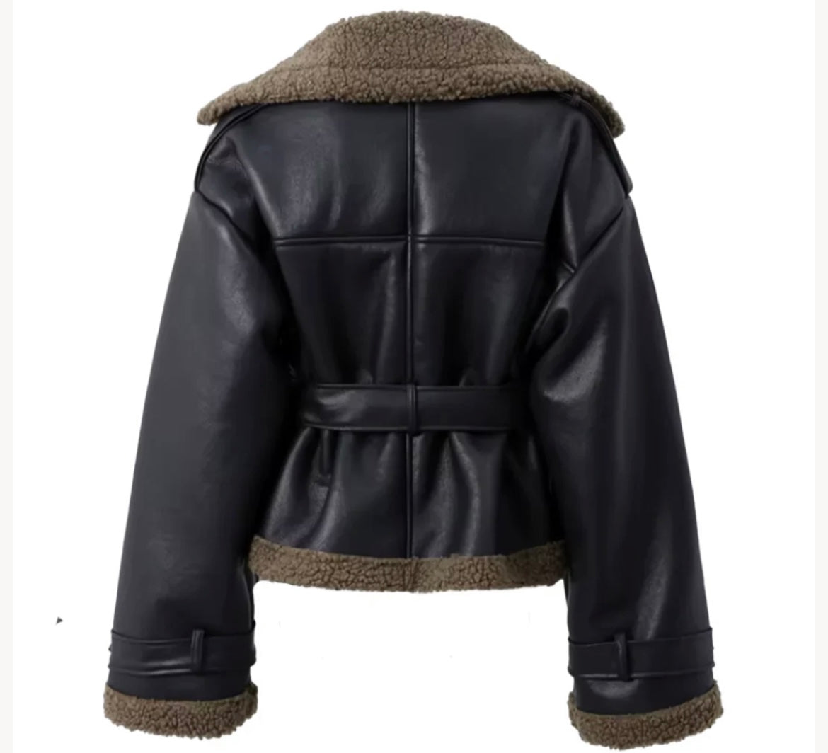 Women's faux leather jacket with teddy fur lining and belt