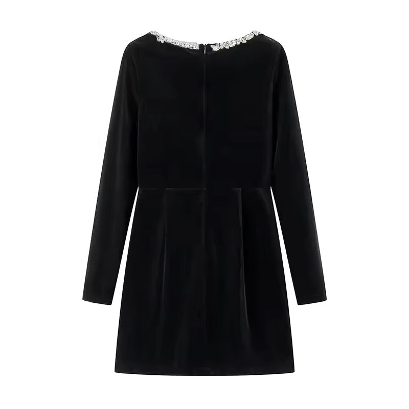 Black velvet dress with pearl embellishment