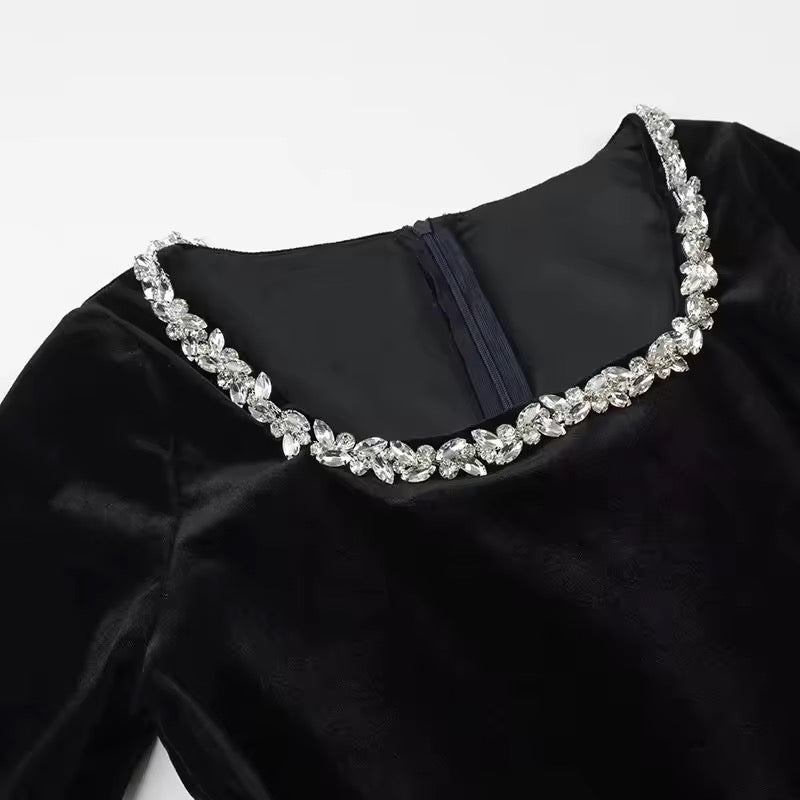 Black velvet dress with pearl embellishment