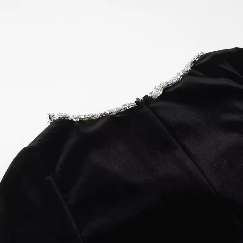 Black velvet dress with pearl embellishment