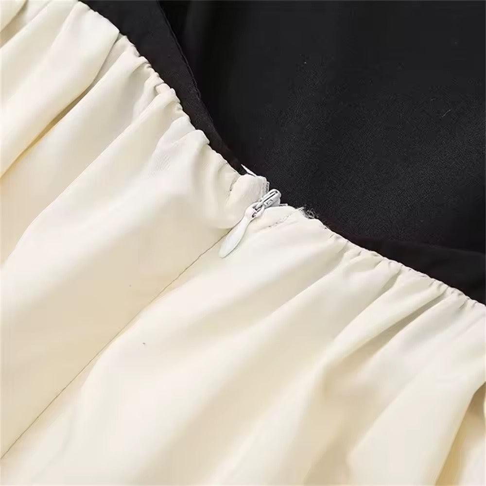 Maxikleid mit Spaghettiträgern – Schwarz & Creme