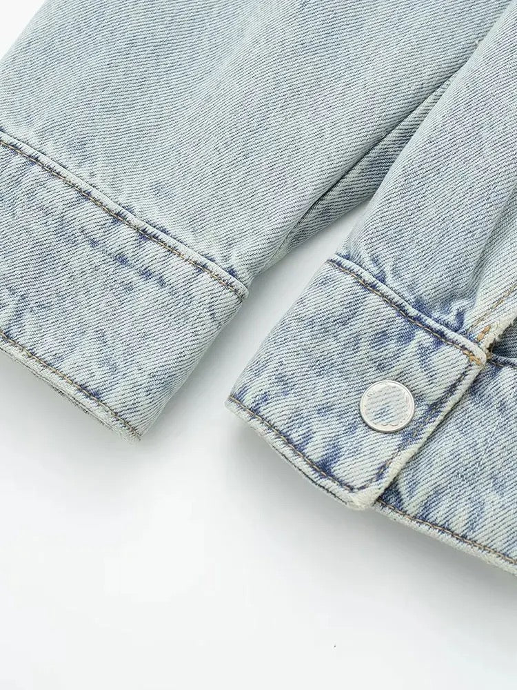 Veste courte en denim bleu clair avec ceinture