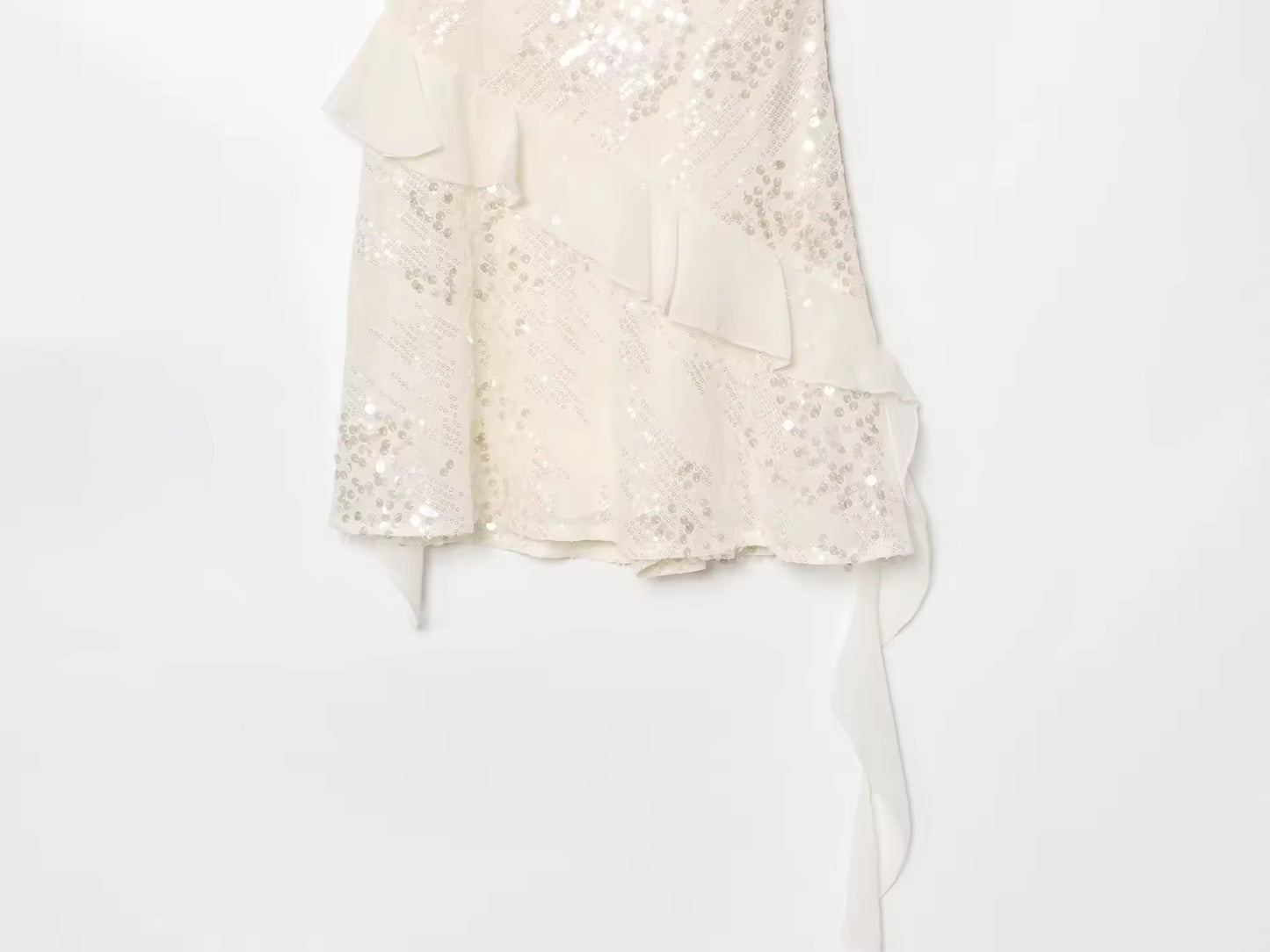 Asymmetrisches Pailletten-Minikleid