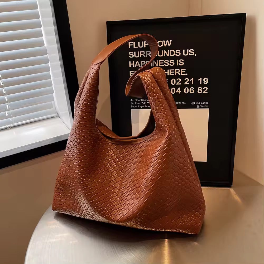 Stylische Schultertasche mit Flechtoptik