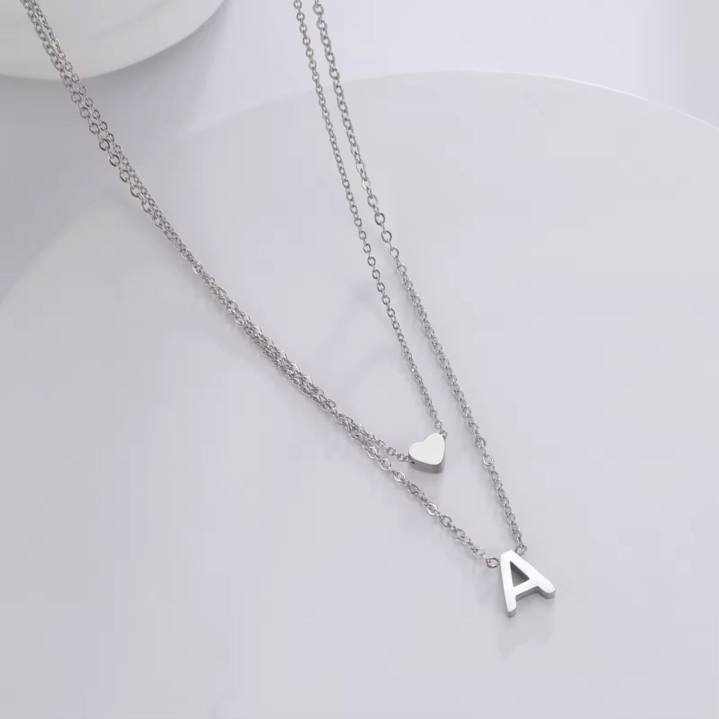 Personalized double necklace with heart and letter pendant