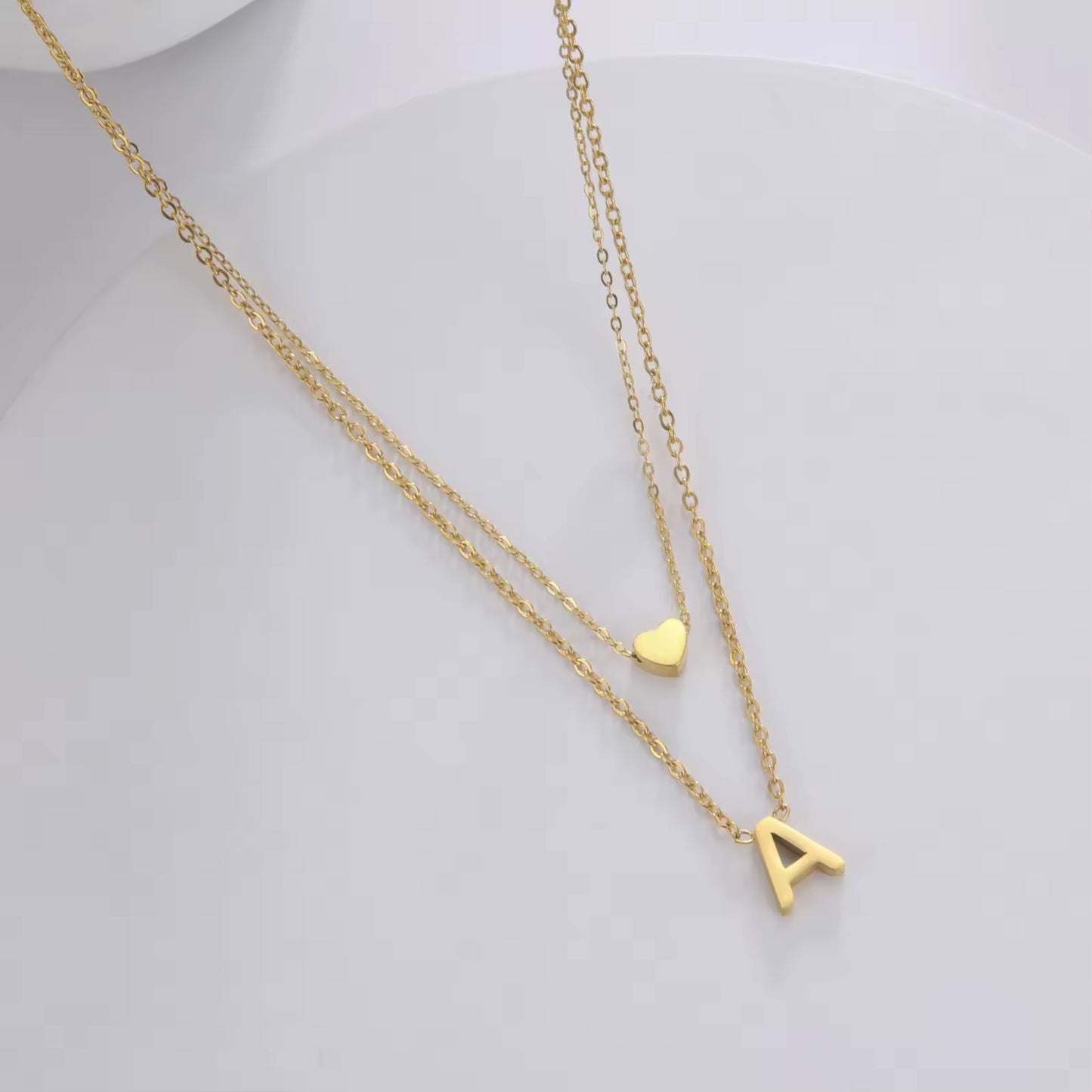 Personalized double necklace with heart and letter pendant
